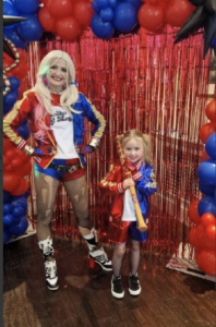 Sophie as Harley Quinn with chold shown in matching outfit