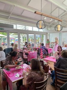 Barbie entertainer hosting a party in a garden centre