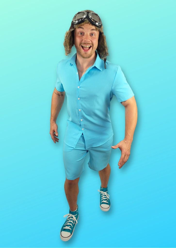 Entertainer impersonating Danny Go. He is wearing a blue outfiot and flying hat 