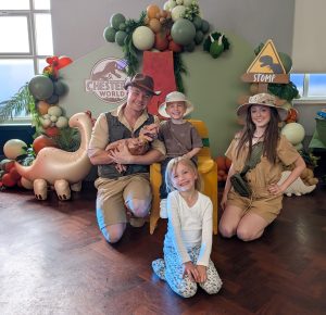 Dino rangers at a party woth 2 children