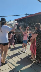 Taylor Swift tribute entertaining children in the sunshine
